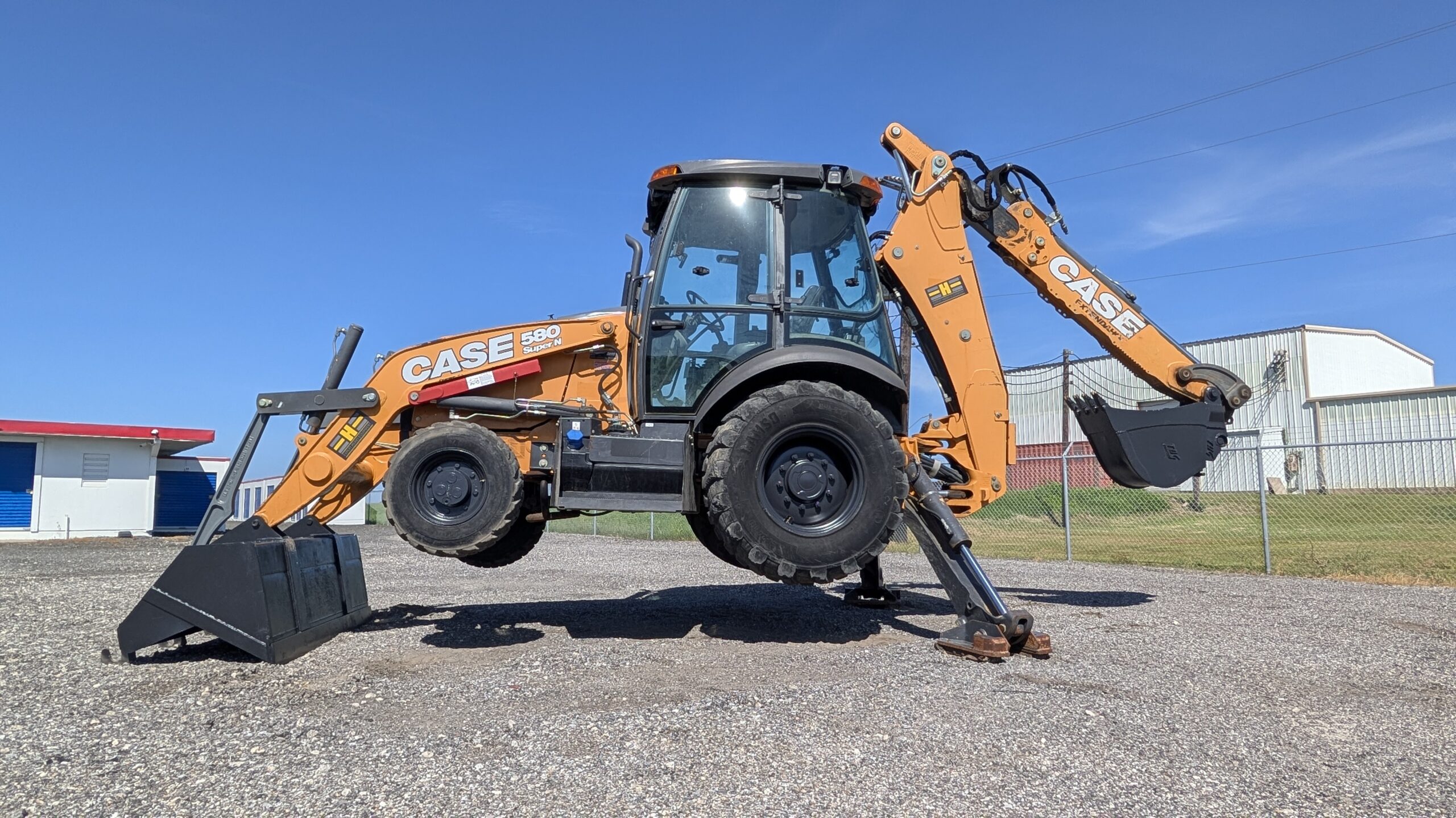 2019 CASE 580 SUPER 4WD EXTEND-A-HOE BACKHOE WITH FRONT & REAR AUX HYDS - 762058